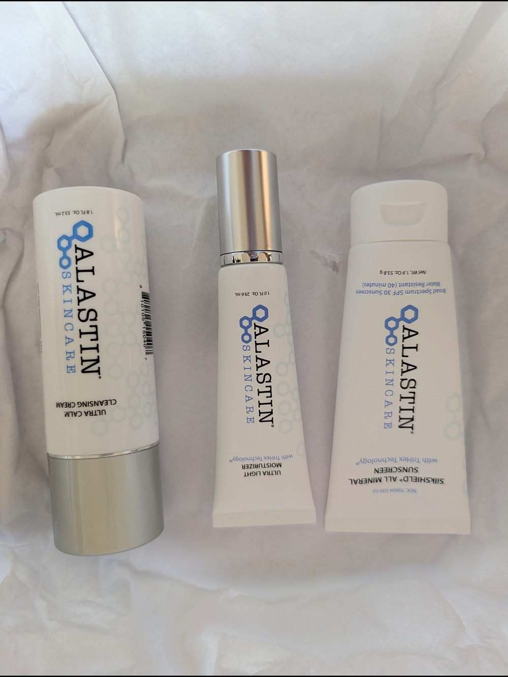 Alastin Skincare Trio in White - Cleansing Cream, Moisturizer & Sunscreen